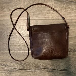 Fossil brown leather crossbody, strap measures 50”